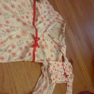 A girls pajama night gown with matching dolls gown